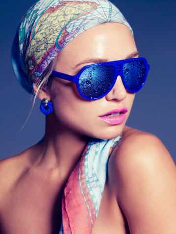 Woman with blue sun glasses
